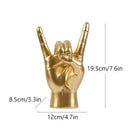 Chic black glossy rock hand gesture sculpture living room decor by Decorbites