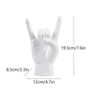 Chic black glossy rock hand gesture sculpture living room decor by Decorbites