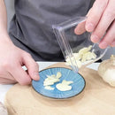 Clear and gray garlic grinding grater cutter kitchen tool by Decorbites