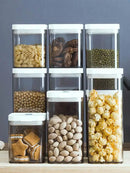 Clear bulk hermetic food storage containers with white lids kitchen by Decorbites