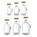 Clear glass beverage bottles with silver caps – kitchen juicing set by Decorbites