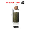 Clear glass bottle dispenser set with cork stoppers kitchen jars by Decorbites