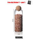Clear glass bottle dispenser set with cork stoppers kitchen jars by Decorbites