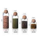 Clear glass bottle dispenser set with cork stoppers kitchen jars by Decorbites