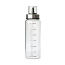 Clear glass condiment bottle set with measurements for kitchen by Decorbites
