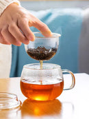 Clear glass floral tea cup with filter and lid kitchen teaware by Decorbites