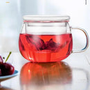Clear glass floral tea cup with filter and lid kitchen teaware by Decorbites