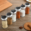 Clear glass rotating spice jar set – kitchen seasoning bottles by Decorbites
