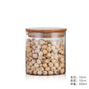 Clear glass storage jars with bamboo lids for kitchen organization by Decorbites