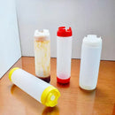 Clear red white & yellow tomato squeeze bottle kitchen set by Decorbites