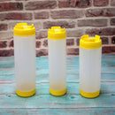 Clear red white & yellow tomato squeeze bottle kitchen set by Decorbites