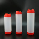 Clear red white & yellow tomato squeeze bottle kitchen set by Decorbites