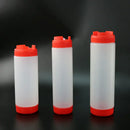 Clear red white & yellow tomato squeeze bottle kitchen set by Decorbites