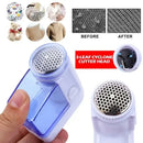 Compact blue & white electric fuzz pellet remover bedroom fabric shaver by Decorbites