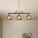 GobekUsa Contemporary 3-Bulb Sphere Pendant Light Fixture for Dining Hall Island - Clear/Smoke Gray Glass Design