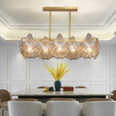 GobekUsa Contemporary Amber Crystal Pendant Light with Brass Island Lighting - 8 Lights, Linear Metal Arm