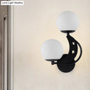 GobekUsa Contemporary Bedroom Sconce Light: 2 Bulbs Black/Gold Wall Lamp with Milky Glass Ball Shades (Left/Right)