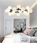 GobekUsa Contemporary Black and Gold Chandelier - White Glass Ball