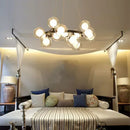 GobekUsa Contemporary Black and Gold Chandelier - White Glass Ball