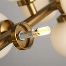 GobekUsa Contemporary Black and Gold Chandelier - White Glass Ball