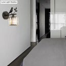 GobekUsa Contemporary Wall Sconce with K9 Crystal Cylinder, Bird Accent, and Black/Gold Finish