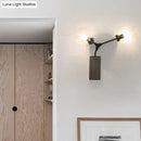 GobekUsa Contemporary Black/Gold Wall Sconce with Oval Amber/Gold/Clear Glass Shade - Elegant Half-Light Wall Mount