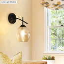 GobekUsa Contemporary Black/Gold Wall Sconce with Oval Amber/Gold/Clear Glass Shade - Elegant Half-Light Wall Mount
