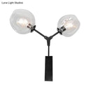 GobekUsa Contemporary Black/Gold Wall Sconce with Oval Amber/Gold/Clear Glass Shade - Elegant Half-Light Wall Mount