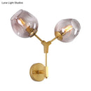GobekUsa Contemporary Black/Gold Wall Sconce with Oval Amber/Gold/Clear Glass Shade - Elegant Half-Light Wall Mount