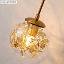GobekUsa Contemporary 1-Light Clear Glass Bubble Wall Lamp with Foil Flower Decor