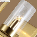 GobekUsa Contemporary Brass Wall Sconce with Clear Glass Shade - Cylindrical Bedroom Light Fixture