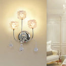 GobekUsa Contemporary Chrome Wall Sconce with Floral Crystal Shade - 3 Heads, Curvy Metal Arm