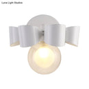 GobekUsa Contemporary Clear Glass Round Wall Lamp - 1 Light White Wall Mounted Fixture with Bow Design
