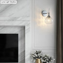 GobekUsa Contemporary Clear Glass Wall Sconce with Inner Crystal Strand and Chrome Finish