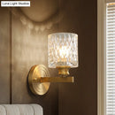 GobekUsa Contemporary Cylindrical Wall Light: Stylish Clear Dimpled Glass Design, Golden Wall Sconce for Bedroom