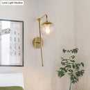 GobekUsa Contemporary Glass Wall Sconce with Brass Finish Arm - 1 Bulb Bedroom Light