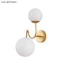 GobekUsa Contemporary Gold Metal Wall Sconce with Curved Arms, 2 Heads, and White Glass Shade