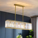GobekUsa Contemporary Gold Rectangular Island Pendant Light with Tri-Prism Crystal Accents - 3 Bulbs - Dining Room Ceiling Fixture