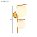 GobekUsa Contemporary White Glass Spherical Sconce with 2 Gold Heads - Wall Mounted Light Fixture