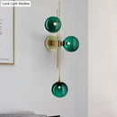 GobekUsa Contemporary Green/Clear Glass Globe Wall Sconce Lamp with 3 Lights in Brass