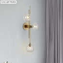 GobekUsa Contemporary Green/Clear Glass Globe Wall Sconce Lamp with 3 Lights in Brass