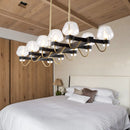 GobekUsa Contemporary Island Lamp: 10 Glass Bulbs in Clear/Amber/Smoke Suspended Fixture - Black/Brass for Bedroom