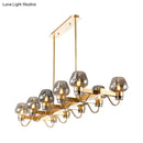 GobekUsa Contemporary Island Lamp: 10 Glass Bulbs in Clear/Amber/Smoke Suspended Fixture - Black/Brass for Bedroom