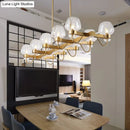 GobekUsa Contemporary Island Lamp: 10 Glass Bulbs in Clear/Amber/Smoke Suspended Fixture - Black/Brass for Bedroom