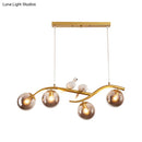 GobekUsa Contemporary Metal Branch Hanging Lamp Island Pendant - 4-Light Black/Gold with Bird Deco and Smoke Grey/Cognac Glass Shade