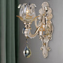 GobekUsa Contemporary Wall-Mounted Floral Sconce Light Fixture with Crystal Drop - Clear Glass, 1/2 Heads