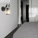 GobekUsa Contemporary Wall Sconce with K9 Crystal Cylinder, Bird Accent, and Black/Gold Finish