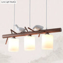 GobekUsa Contemporary Wood Island Pendant with Nutcracker Design and Cylindrical Glass Shades - Set of 3 Lights