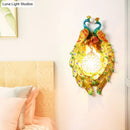 GobekUsa Country Style Peacock Wall Sconce with Crystal Shade for Bedroom - Yellow Resin 1-Light Lamp