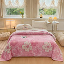 Cozy white fleece blanket with colorful flower patterns bedroom decor by Decorbites